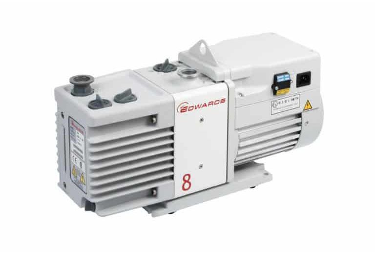 A white Edwards vacuum pump, featuring a control panel and power switch, is labeled "8." This horizontal rectangular device boasts ribbed sides and multiple ports on the top. A perfect fit among your Air Compressor Parts and Accessories.